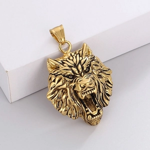 Close-up of golden wolf head pendant with vintage texture and detailed rock hip hop design