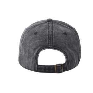 Detail view of adjustable metal buckle and vintage washed cotton texture on back of cap
