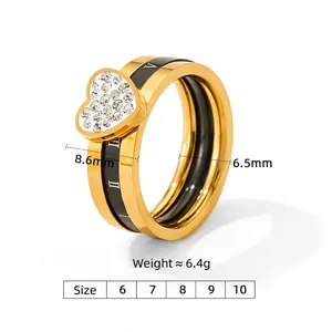 Gold-plated stainless steel heart ring with black enamel and Roman numeral engraving