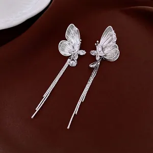 Eleganti orecchini a farfalla con nappa in oro 18k e zirconi, ago in argento 925