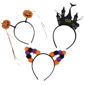 Three Halloween headbands featuring pumpkin, bat and colorful pom-poms for party decor
