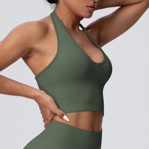 Close-up of olive green seamless ribbed yoga set showing halter neck and fabric texture