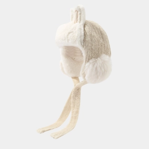 Close-up of winter plush rabbit ear hat showing soft faux fur and knit texture details