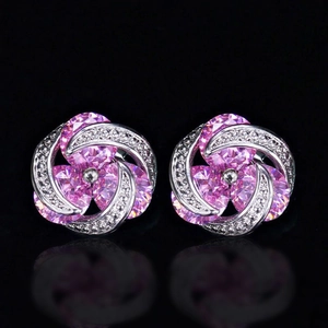 Pink zircon flower stud earrings in silver finish with three-petal design and mirror reflection