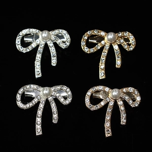 Elegant bow brooch pins with sparkling rhinestones and white pearls in gold and silver