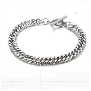 Macro detail of 7mm curb chain link bracelet with OT toggle clasp in steel finish