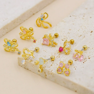Golden stud earrings set with colorful zircon in heart, cherry, and butterfly shapes