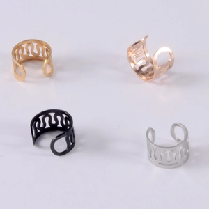 Set of four stainless steel hollow wave ear cuffs in gold, rose gold, black, and silver