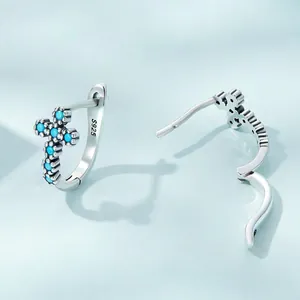 S925 sterling silver cross hoop earrings with turquoise stones in a minimalist vintage style