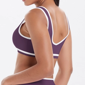 Soutien-gorge de sport violet foncé pour femmes avec bordure contrastée et dos ouvert