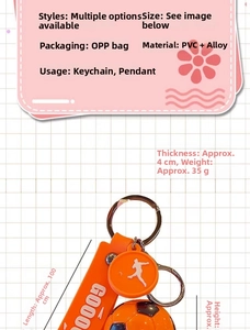 Detailed view of orange soccer keychain with silicone strap and alloy hook attachment