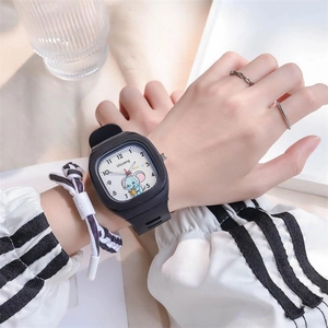 Close-up of a black square silicone watch featuring a cute blue elephant cartoon on dial