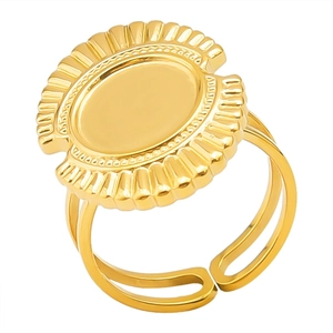 Detail of vintage gold-plated stainless steel ring with oval face and pleated edges