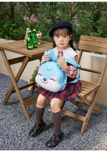 Detail of blue rabbit kid backpack with adjustable straps and cute 3D EVA character face