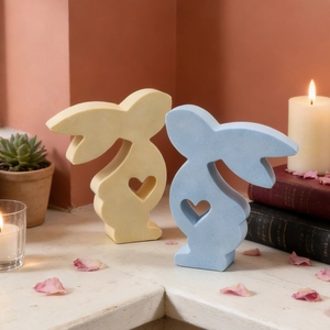 Pastel rabbit candle molds for DIY Easter resin crafts with heart-shaped cutouts