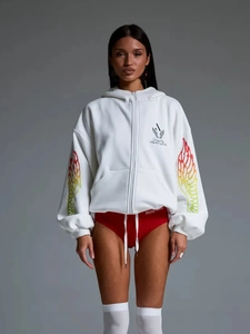 Detail view of white zip-up hoodie featuring colorful gradient wing prints on sleeves