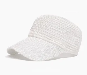 Close-up of white mesh fabric texture on summer baseball cap for breathability
