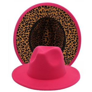 Hot pink wide brim fedora hat with leopard print lining and stylish minimalist design