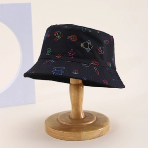 Close-up of kids black cotton sun hat with colorful bear and bee cartoon patterns