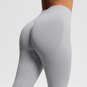 Close-up of seamless light gray high-waisted yoga pants with ribbed texture and butt lifting