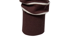 Detailed macro view of the brown ribbed cuffs with a white stripe on a men's knit sweater