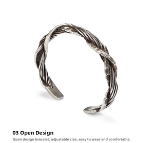 Detailed view of handmade silver cuff with retro hammered texture and woven patterns