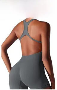 Detail of a dark grey seamless backless yoga bodysuit highlighting the sculpted fit
