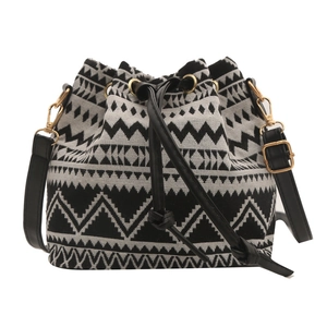 Ethnic geometric pattern bucket bag with black leather drawstring and adjustable strap