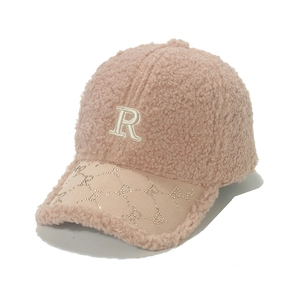 Pink lamb wool baseball cap featuring R letter embroidery and rhinestones on the brim