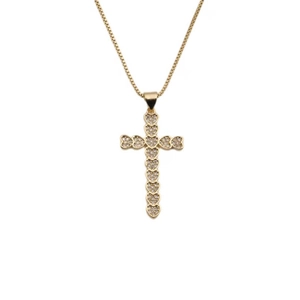 Elegant gold heart cross pendant necklace with zircon stones on a white background