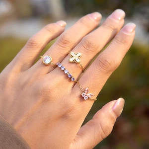 Adjustable gold chain rings set with zircon flower and butterfly charms for women