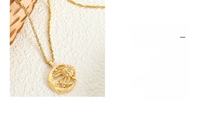 Macro shot of retro sun and moon pendant necklace with delicate sparkling crystals