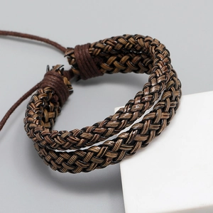 Handmade woven double-layer leather bracelet in brown and beige with adjustable cord