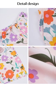 Détails du cordon de serrage, imprimé fleuri et texture du tissu du short rose