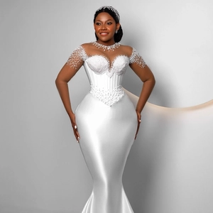 Elegant white satin mermaid wedding dress with pearl embroidery and corset bodice