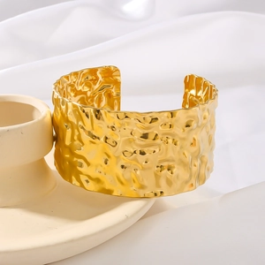 Minimalist wide open cuff bracelet with hammered 18K gold-plated stainless steel texture