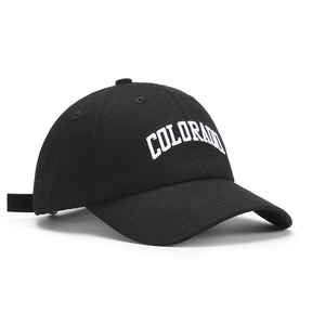 Black baseball cap with white COLORADO embroidery and adjustable strap in a 45-degree view