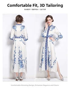 Detail of white long sleeve dress featuring blue floral pattern and belted waist slit hem