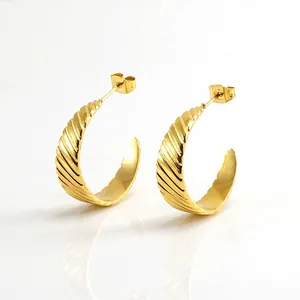 Classic 18K gold plated titanium steel hoop earrings with ribbed texture and glossy finish
