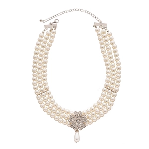 Baroque multi-layer pearl necklace featuring a diamond flower charm and drop pearl pendant