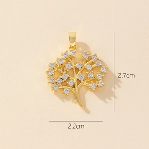 Close-up of golden tree of life pendant with cubic zirconia and size dimensions 2.7x2.2cm