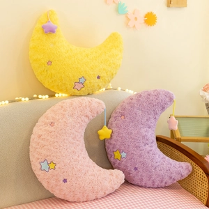 Cute moon shaped plush pillows with star pendants in yellow, pink and purple colors