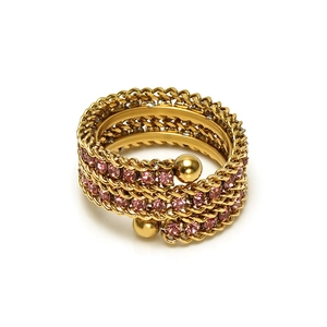 Close-up of gold plated multi-layer woven ring with pink pavé crystals and dual ball ends