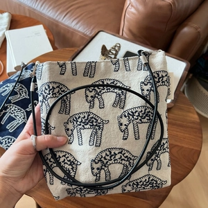 Minimalist cotton linen crossbody bag with black sheep print and slender strap