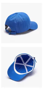 Detail of blue baseball cap showing the adjustable metal buckle and interior lining