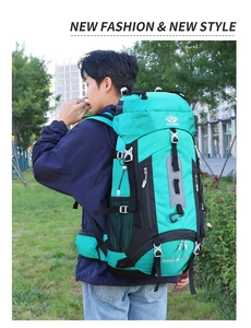 Outdoor 60L hiking backpack in mint green on model showing professional climbing straps
