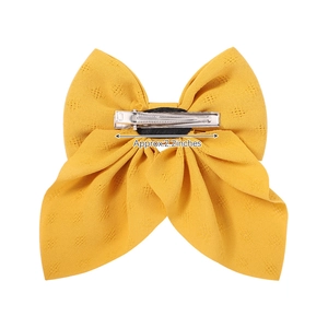 Floral chiffon bow hair clip in bright yellow with a 2.2-inch silver metal alligator clip