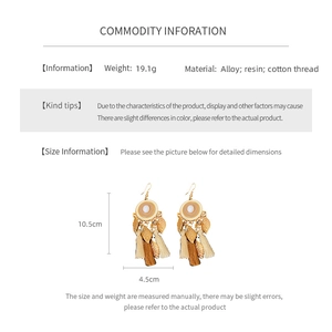 Infographic showing alloy and resin vintage tassel earrings dimensions and 19.1g weight