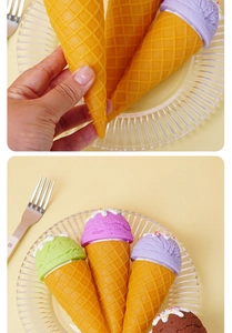Macro detail of artificial ice cream cones with colorful toppings and waffle texture