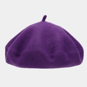 Detail of soft wool texture and classic stalk on deep purple vintage beret hat